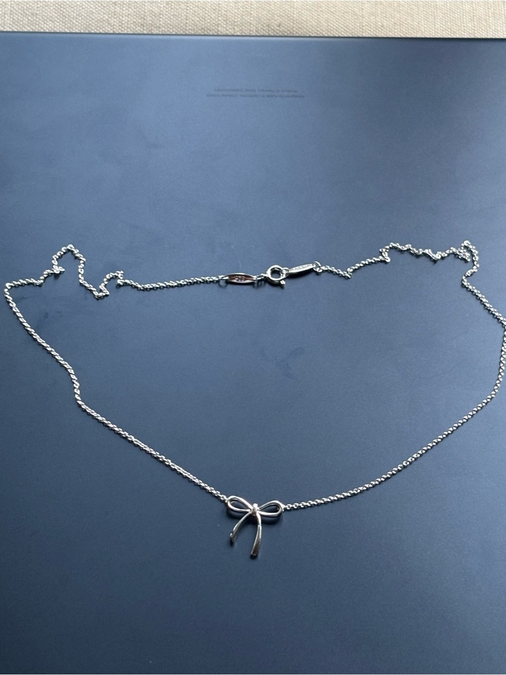 Tiffany & Co. Silver Bow Pendant Necklace with Tiffany Blue Pouch